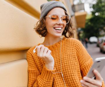 a woman with a phone in her hand